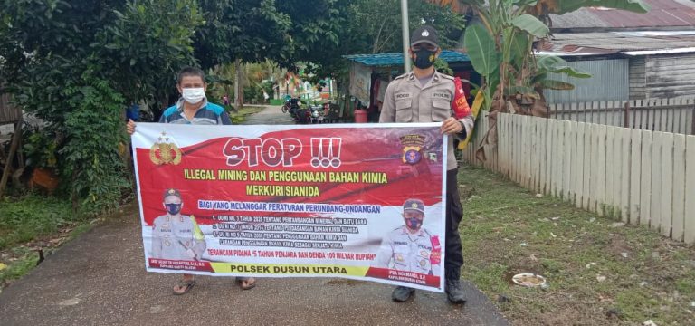 Berbekal Spanduk, Aipda Hogo Sampaikan Ilegal Mining dan Penggunaan Merkuri