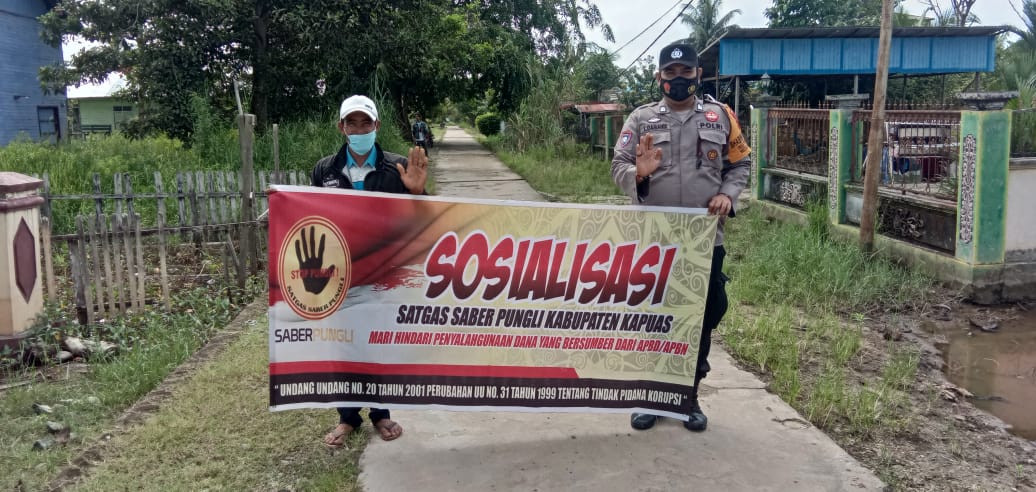 Cegah Pungutan Liar dan Penyalahgunaan Anggaran Desa, Polsek Kapuas Kuala laksanakan giat Sosialisasi Saber Pungli