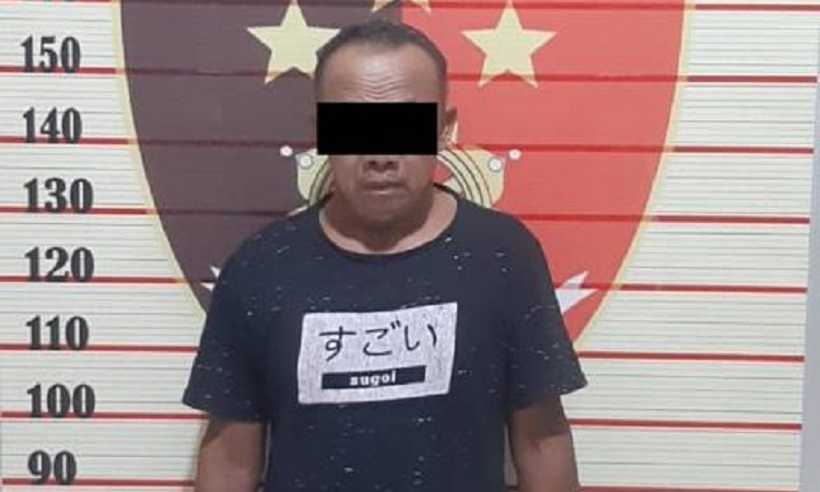 tersangka HM diamankan di mapolres lamandau